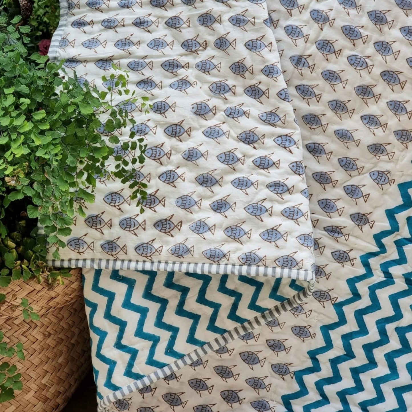 gots-certified-organic-cotton-reversible-baby-quilt-100x120cm-little-fish-blue