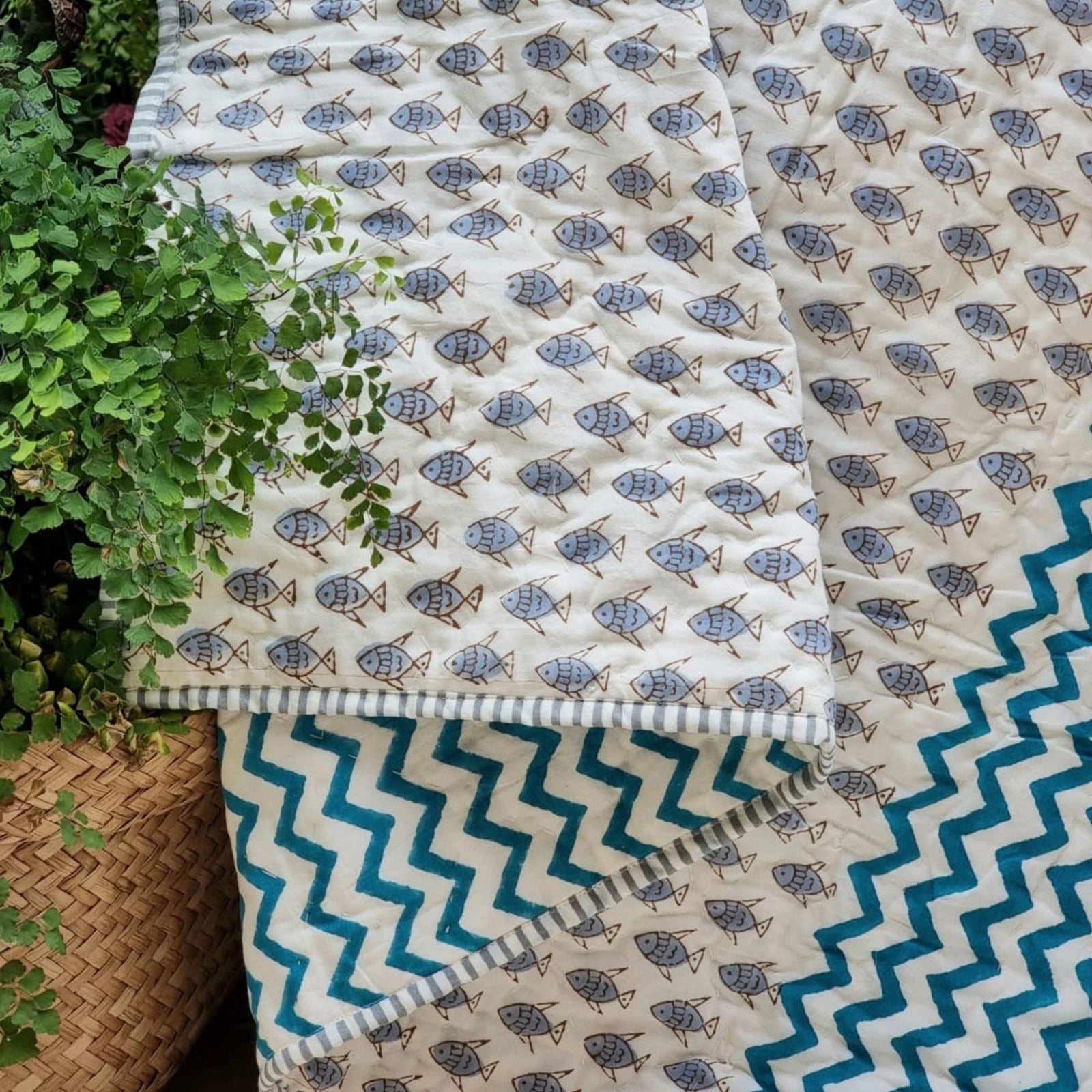 gots-certified-organic-cotton-reversible-baby-quilt-100x120cm-little-fish-blue