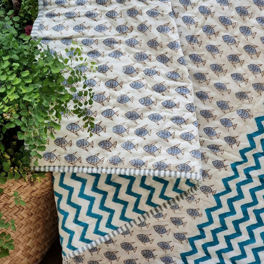 gots-certified-organic-cotton-reversible-baby-quilt-100x120cm-little-fish-blue